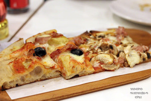 Pizza by slice Pala Pizza Romana Asoke Silom Sukhumvit Bangkok Thailand