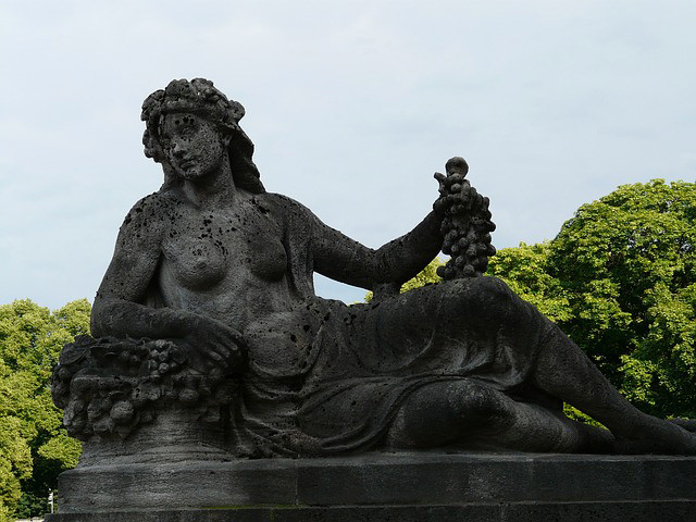 wine woman grapes monument
